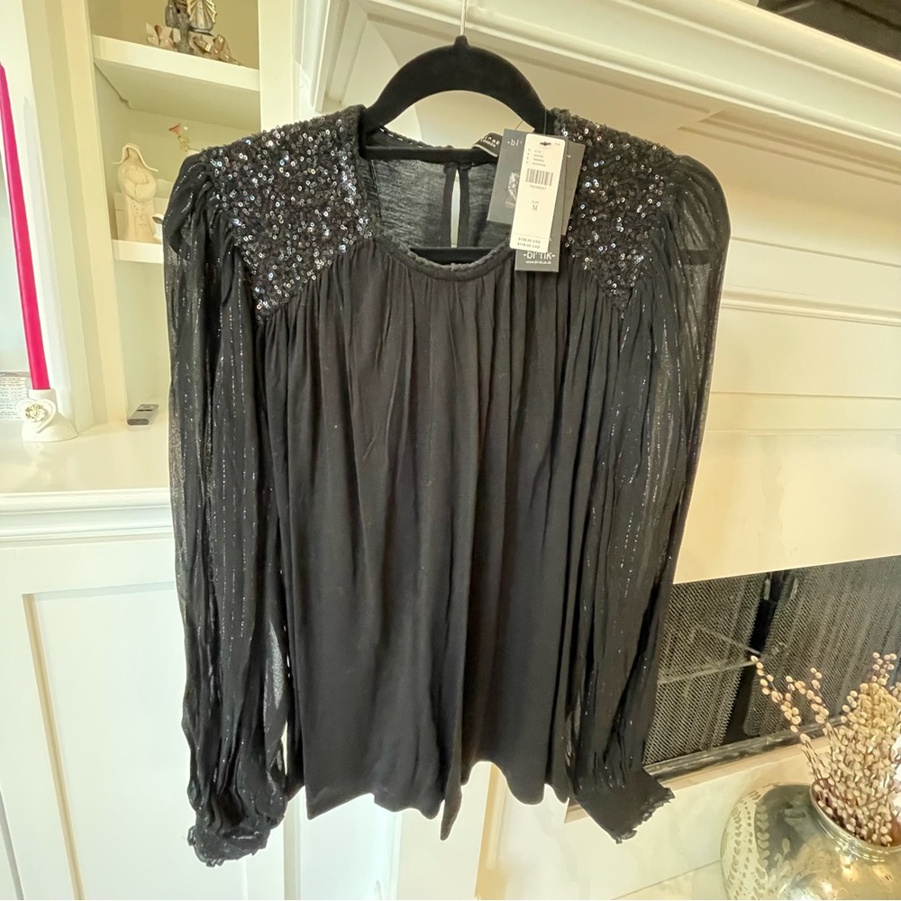 Blank Black top with sequin shoulders. NWT. Size M.
